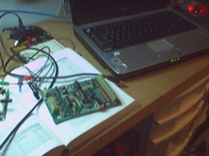 K8055 interface board with laptop in background